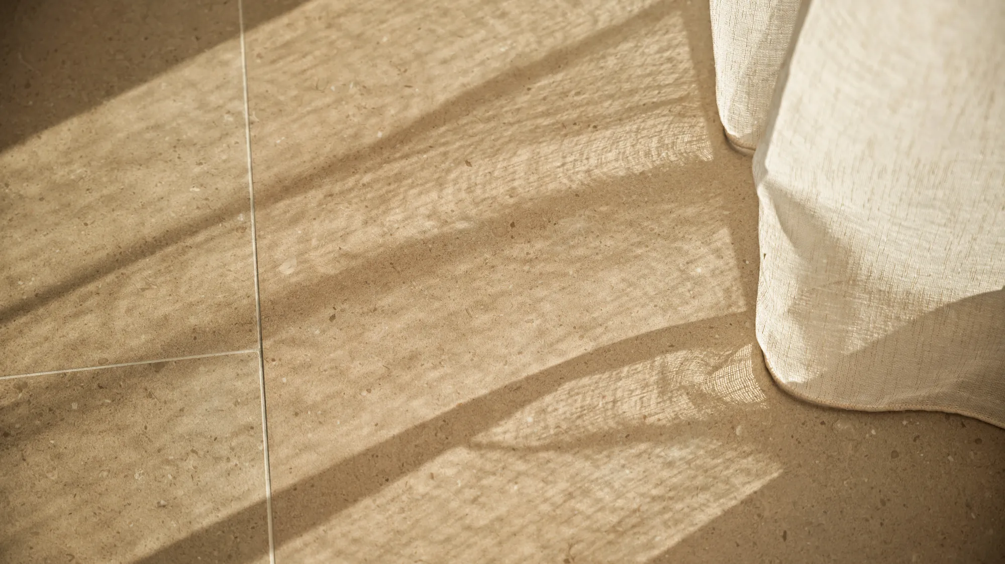 ORMOS Piraeus, sunlight through the linen curtains on the floor