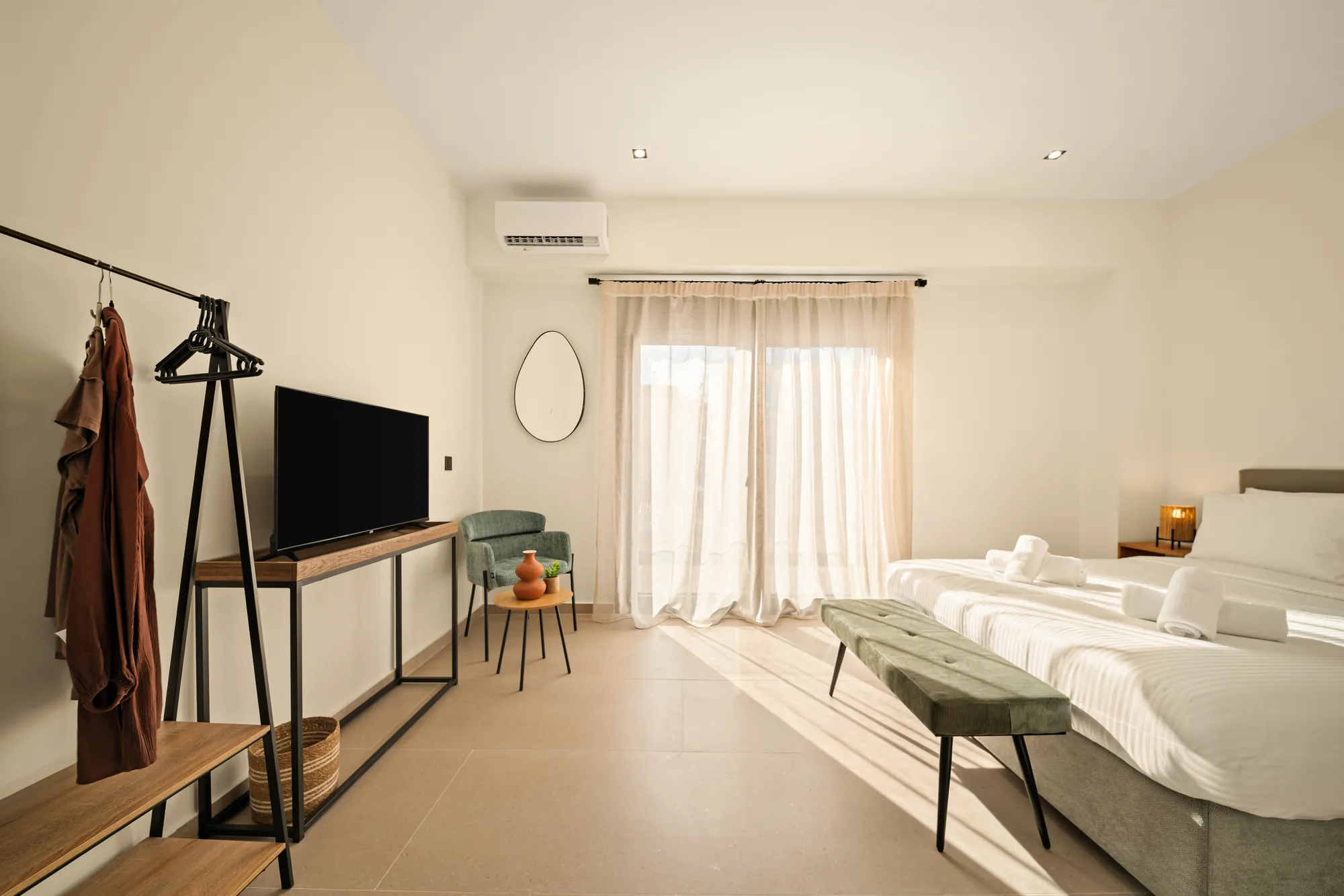 ORMOS Piraeus, the room from the clothes rail toward the balcony