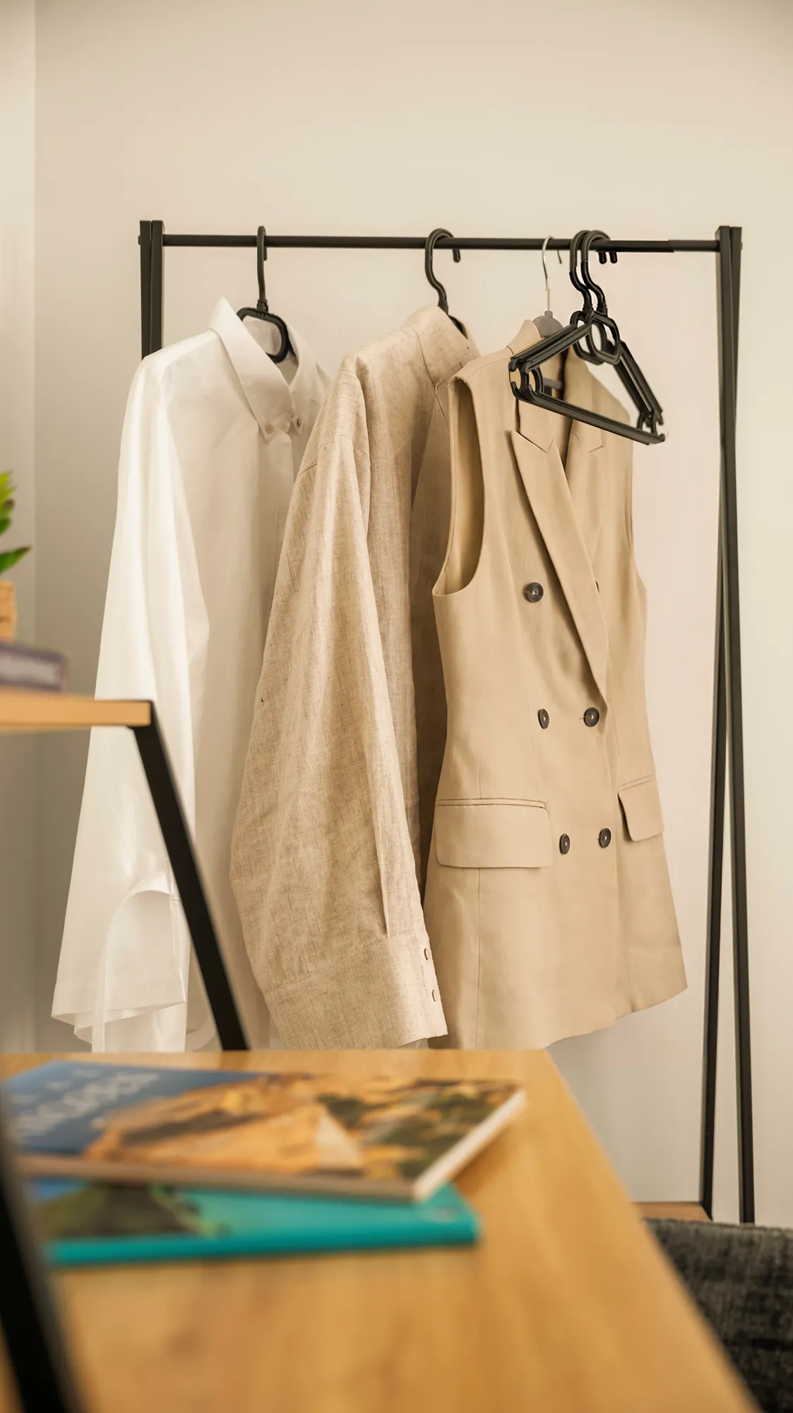 ORMOS Piraeus, linen shirts on the clothes rail by the desk