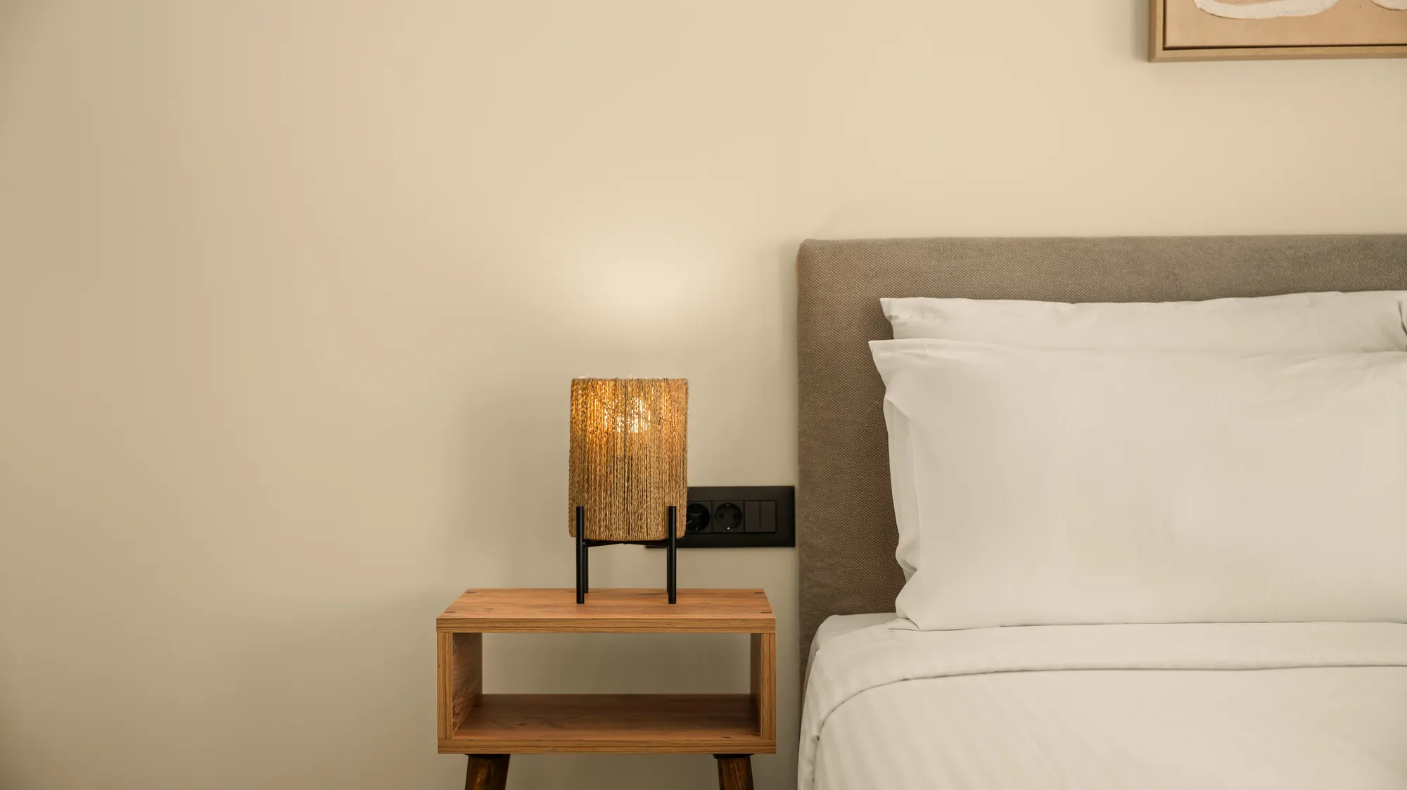 ORMOS Piraeus, the bedside table with the woven lamp
