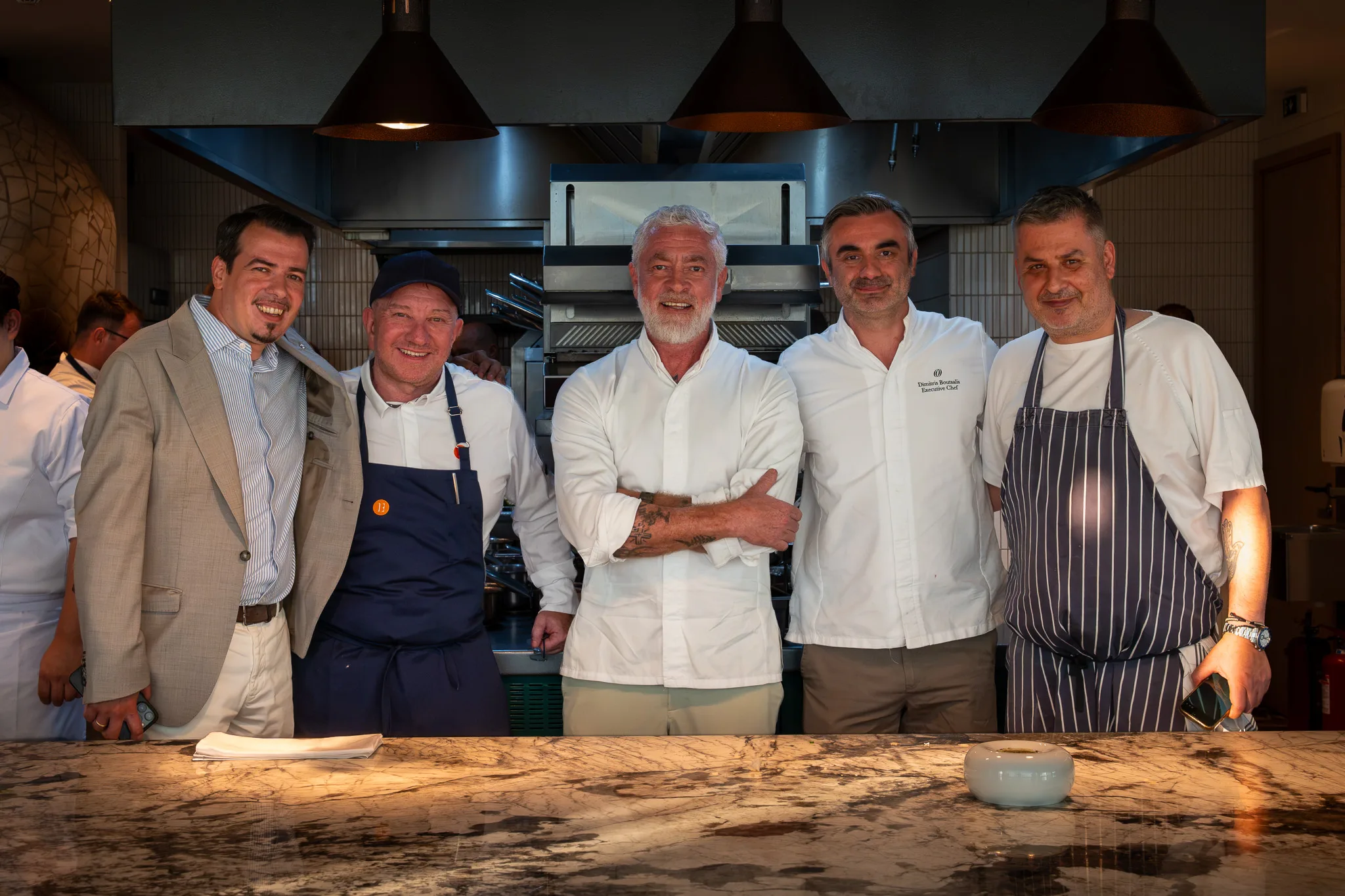 The team photographed together at the pass