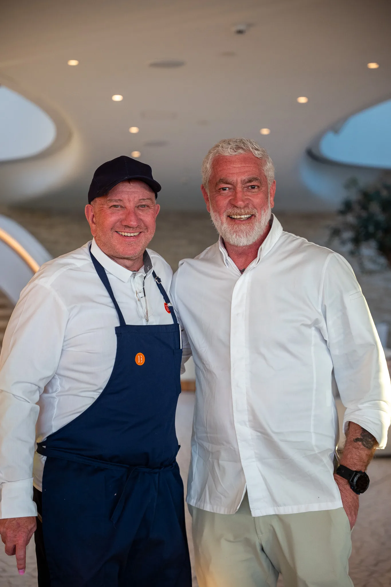 Two of the team photographed in the kitchen